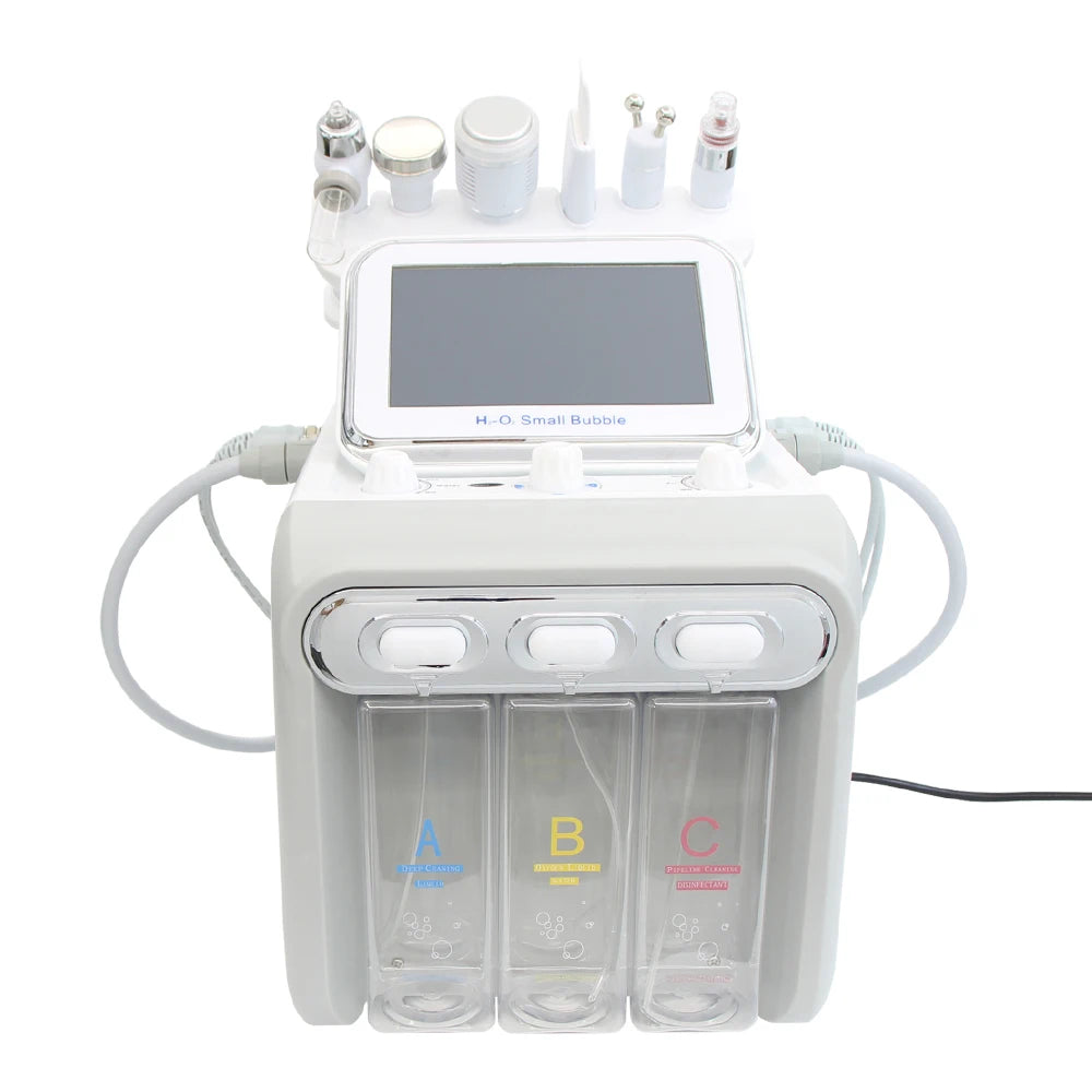 White 7-in-1 hydro dermabrasion spa machine for deep facial cleansing and skin rejuvenation with three liquid bottles.