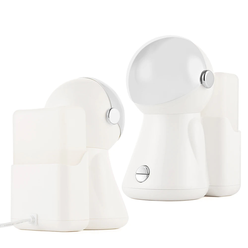 White, spherical LED desk lamps with adjustable heads, chrome accents, and square charging bases.