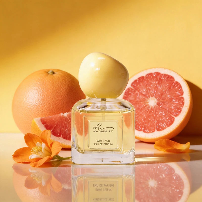 Hope Christine Pomelo EDP for women: 50ml fresh citrus fragrance in a square glass bottle with round yellow cap.