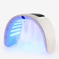 White arched LED light therapy machine with mist function for facial skin care.