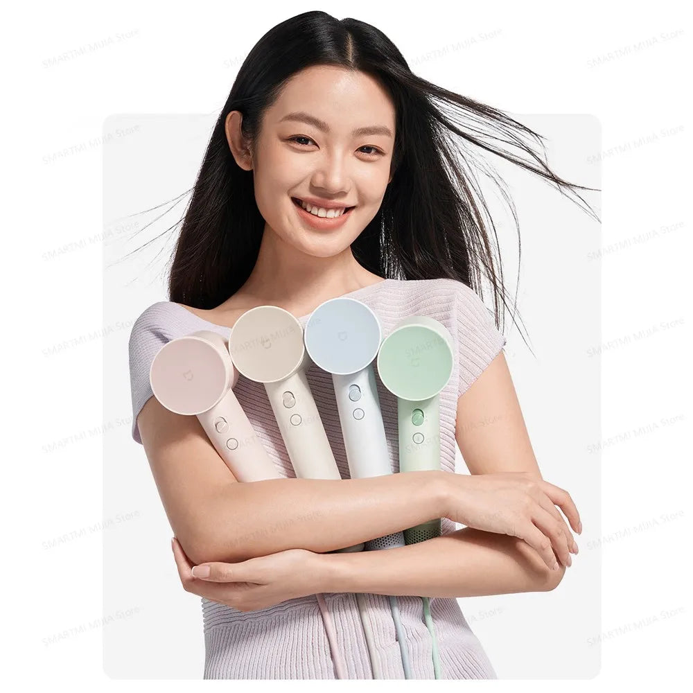 Woman holding 4 colorful MIJIA high-speed hair dryers with powerful 110,000rpm motor and sleek, lightweight design.