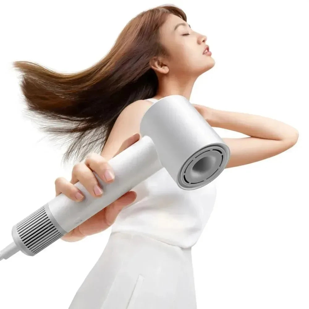 Xiaomi H501 SE high-speed ionic hair dryer in white with compact, ergonomic design for professional salon drying.