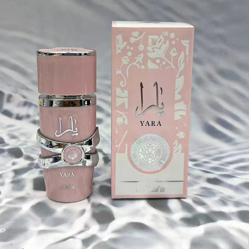 Lattafa Yara 30ml EDP: Floral orchid oud unisex fragrance in a sleek pink bottle with silver accents and matching box.