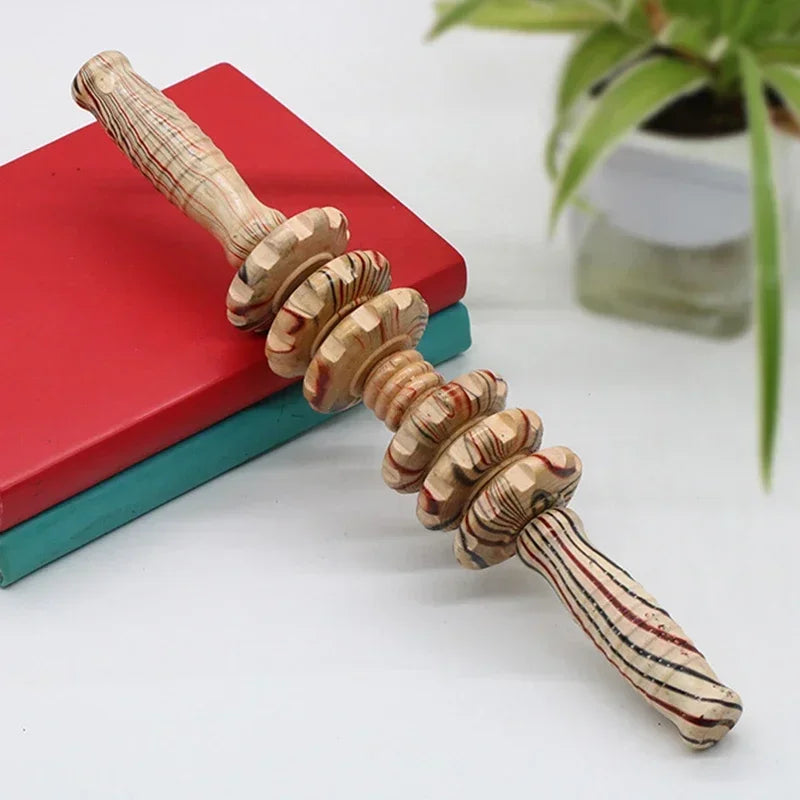 Handheld wooden massage roller with five textured, multi-colored rotating wheels and grip handles for muscle relief.