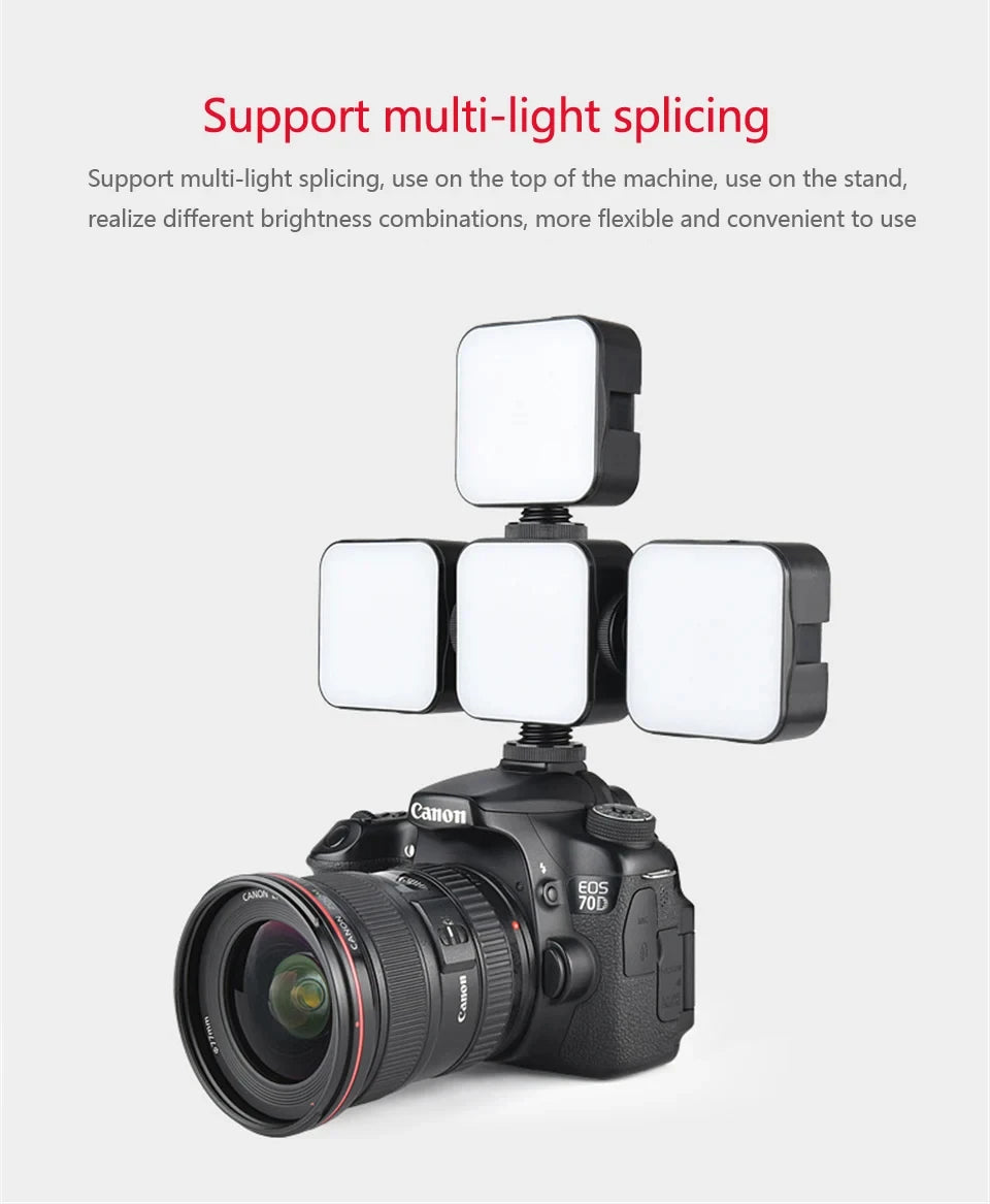 Four square LED video lights connected in a cross shape, mounted on top of a DSLR camera for adjustable lighting.