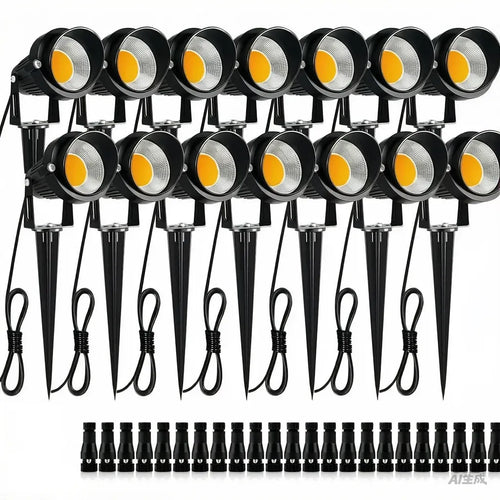 Set of black low-voltage LED landscape spotlights with ground stakes and cables