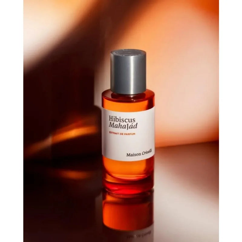 Maison Crivelli Hibiscus Mahajád Extrait de Parfum, unisex luxury scent in a sleek cylindrical glass bottle.