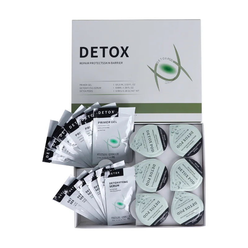 "DETOX" skin repair set in a white box with silver sachets of primer gel, detoxifying serum, and six green pods.