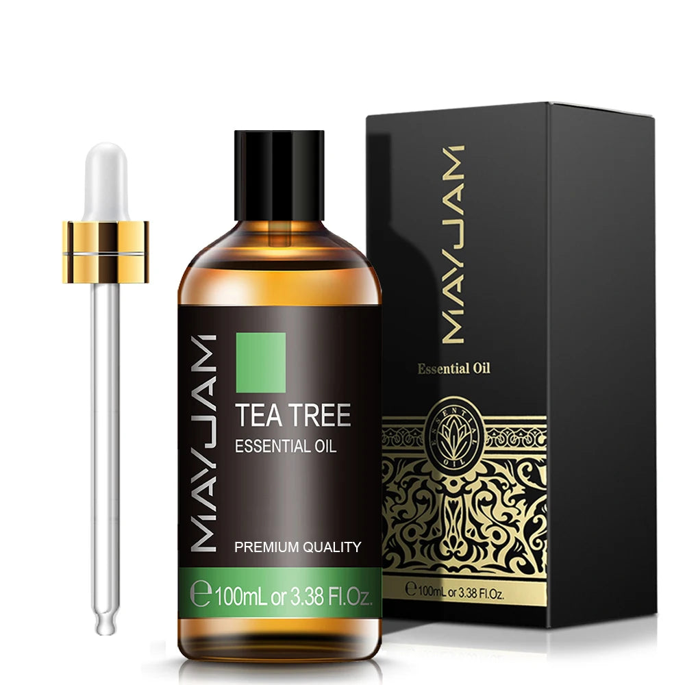 100 mL tea tree essential oil bottle with gold cap and matching dropper