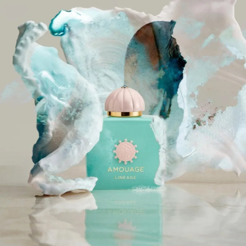 Amouage Lineage EDP: Elegant women's fragrance in a square turquoise bottle with a pink cap, 100ml luxury scent.