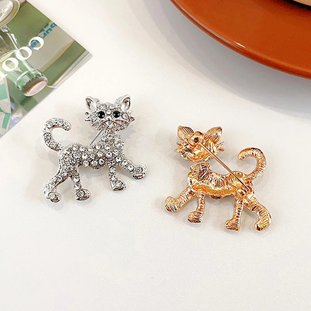 Sparkling crystal cat brooch pins in gold and silver, perfect jewelry gift for cat lovers to decorate clothes and bags.