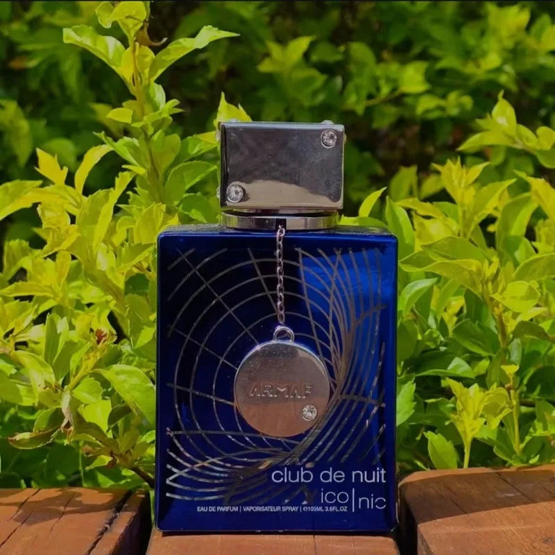 Armaf Club De Nuit Iconic 105ml Men's EDP, blue rectangular bottle with silver charm, seductive night cologne for men.