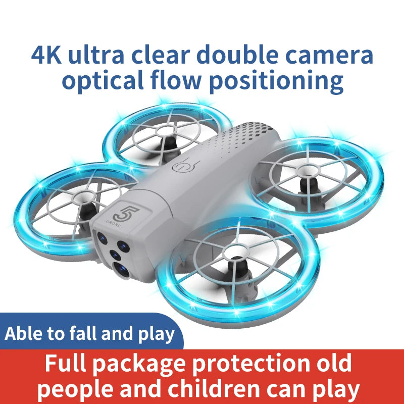 Gray quadcopter drone with protective guards, glowing blue LED rings, and 4K camera for recreational flight.