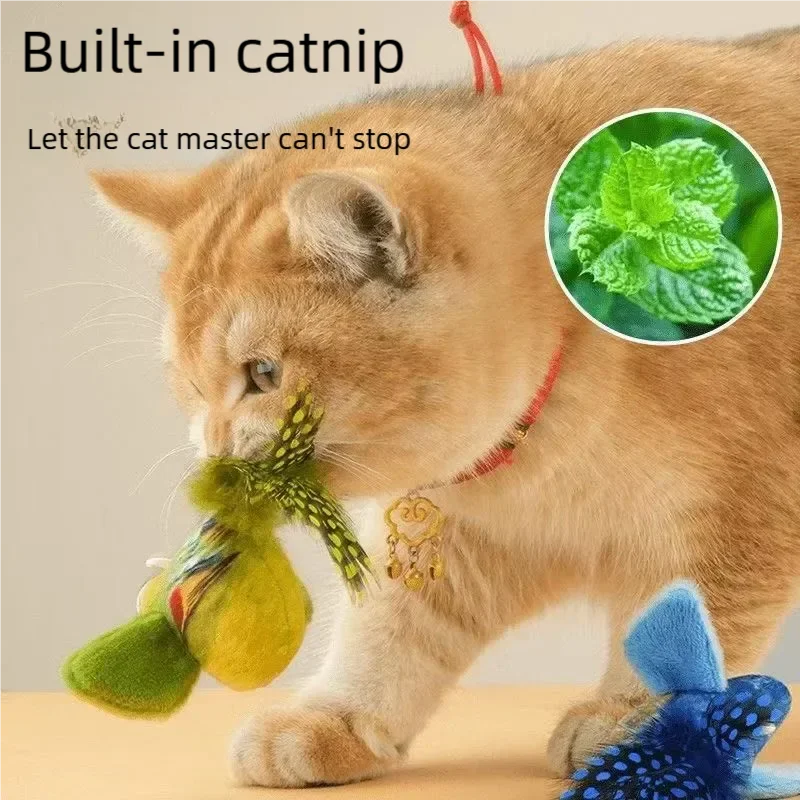 Cat playing with interactive plush bird toy with catnip, flapping wings, and chirping sound for kitten enrichment.