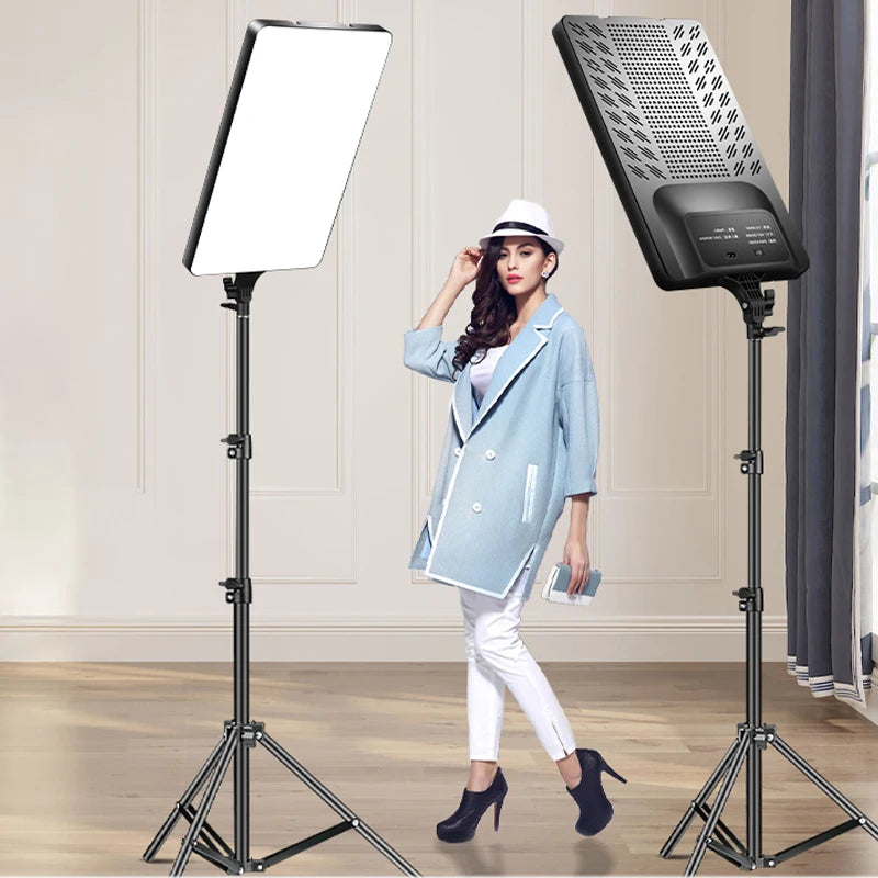 Two rectangular LED panel lights on adjustable metal tripod stands for studio photography and portrait lighting.
