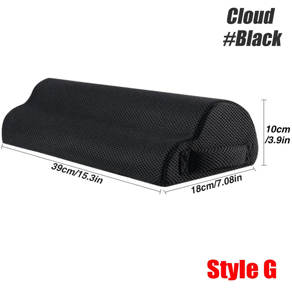 Black ergonomic under desk footrest pillow for back and leg pain relief with dimensions 39x18x10cm.