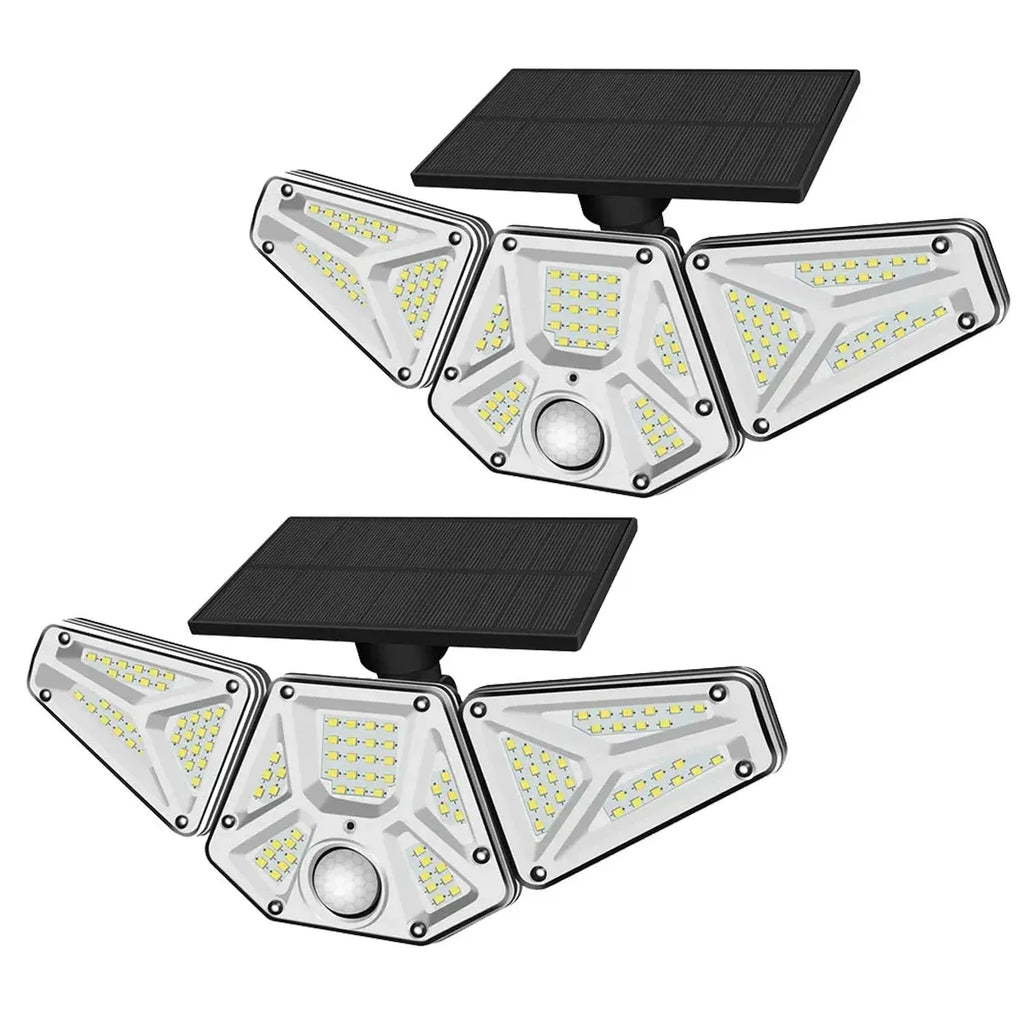 Pair of three-head solar wall lights with black solar panels and LED arrays