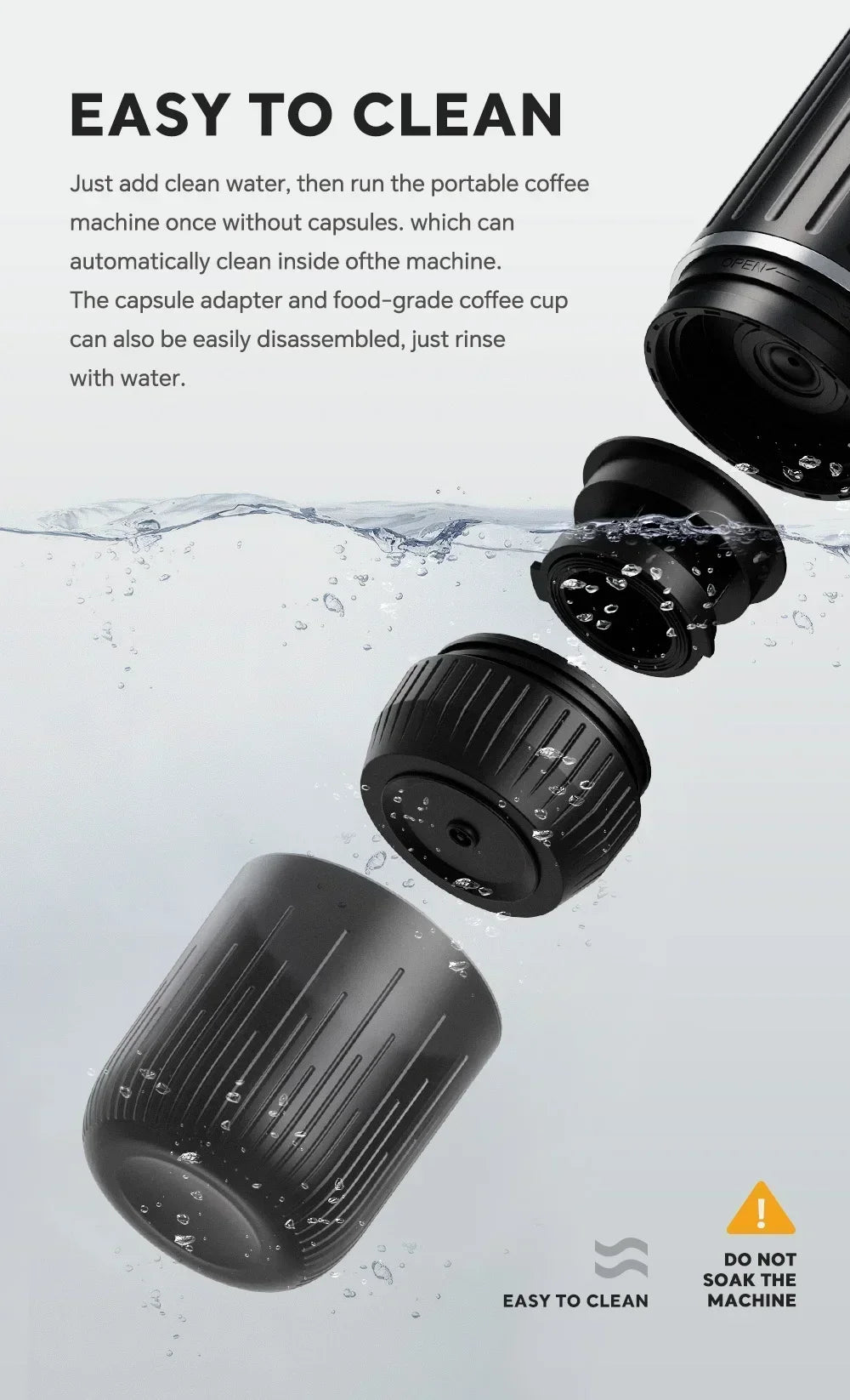 Black portable coffee maker showing detachable, easy-to-clean food-grade components in water.