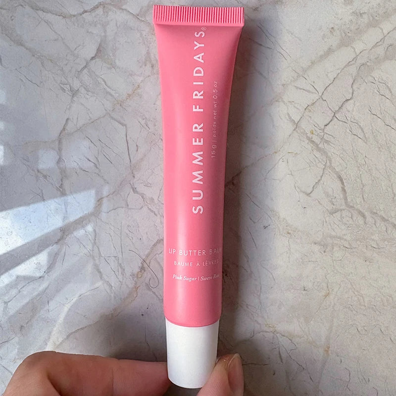 Summer Fridays Pink Sugar Lip Butter Balm in a soft-touch pink squeeze tube for moisturizing, smooth lip makeup.