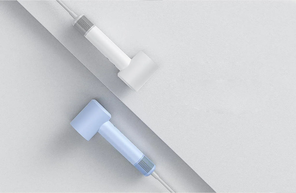 White and blue Xiaomi Mijia H501 SE high-speed ionic hair dryers with sleek, compact professional design.