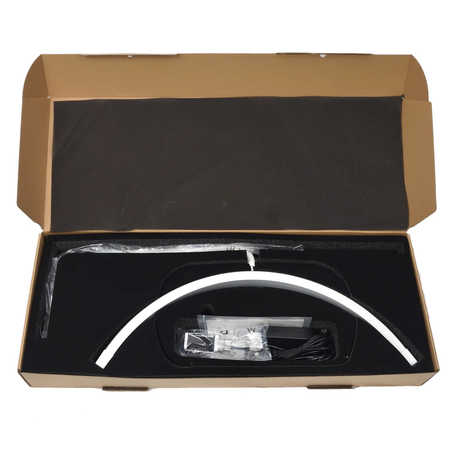 White arched LED lash light with power adapter and manual, packed in a cardboard box with black foam inserts.
