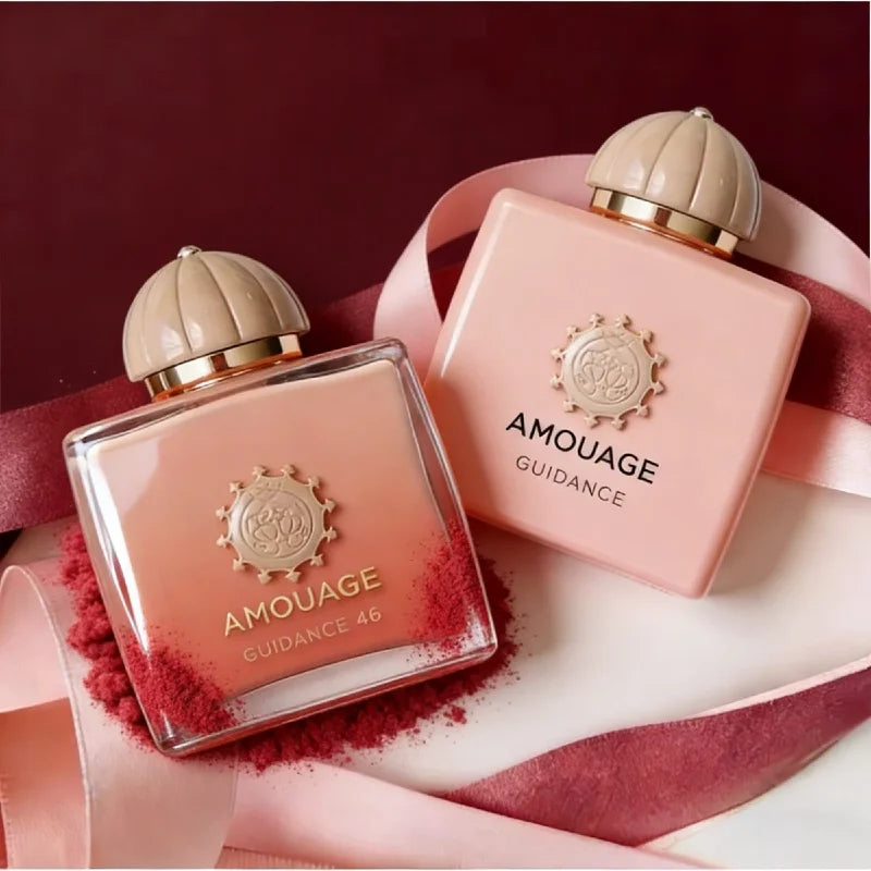 Amouage Guidance EDP: Women's floral oriental perfume in square pink bottles with domed caps. Long-lasting luxury scent.