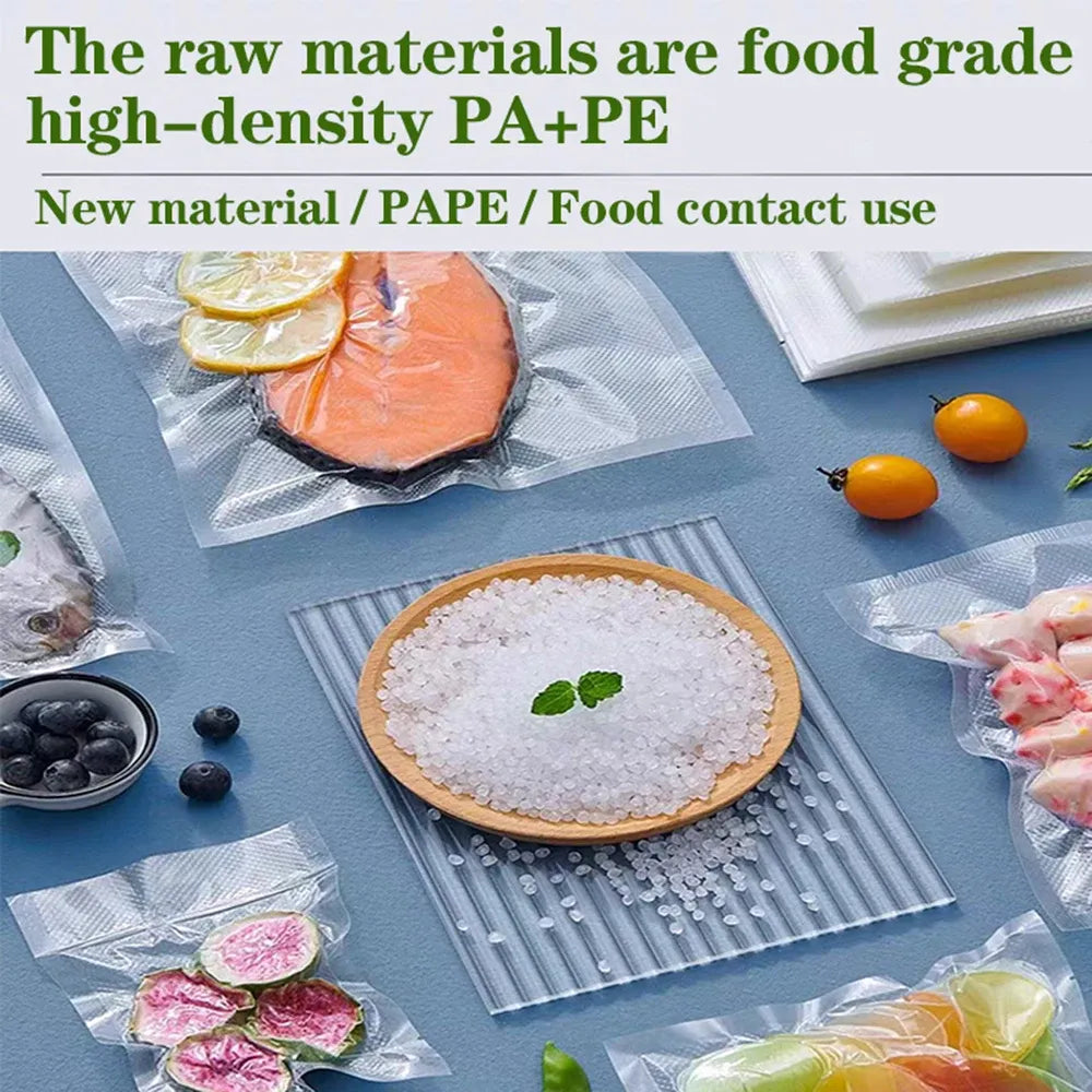 Food-grade vacuum storage bags with sealed vegetables and meat portions inside