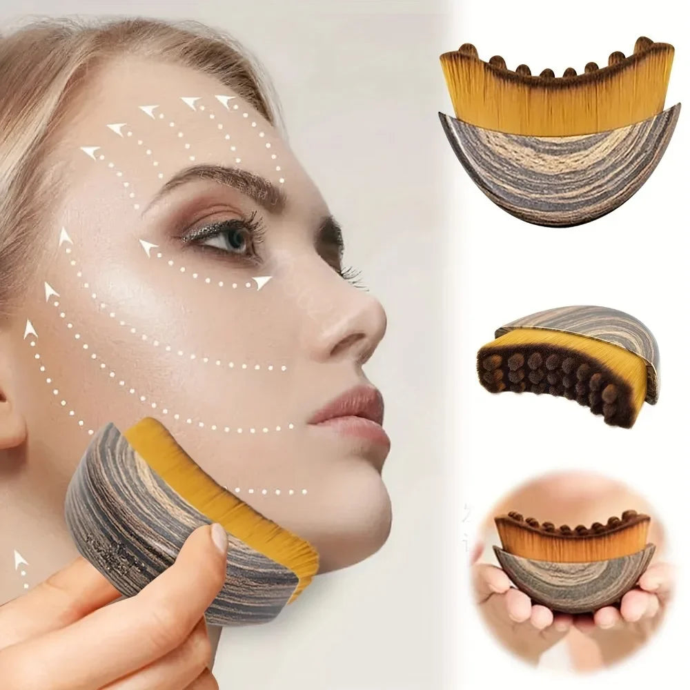 Curved wooden face contour brush with yellow bristles, shown in use for lymphatic drainage massage on a woman’s face.