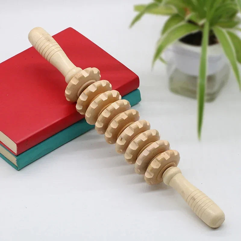 Wooden massage roller with serrated wheels and ergonomic handles for muscle relief and body therapy.