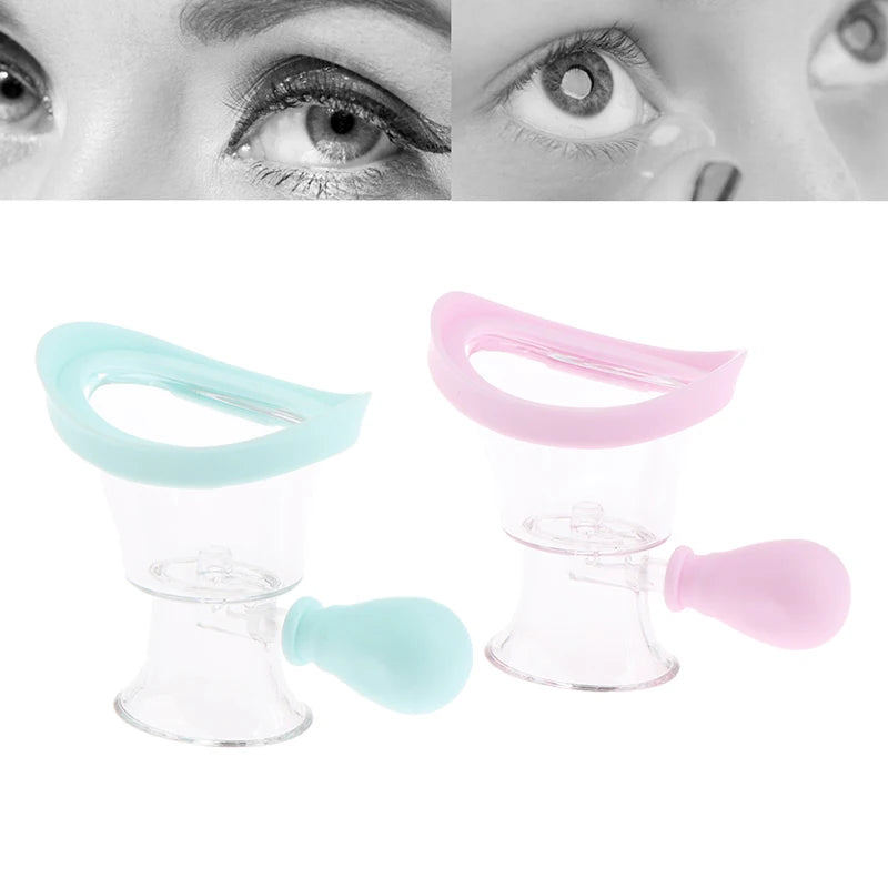 Soft silicone eyewash cups with squeeze bulbs for gentle eye cleaning and rinsing in blue and pink colors.