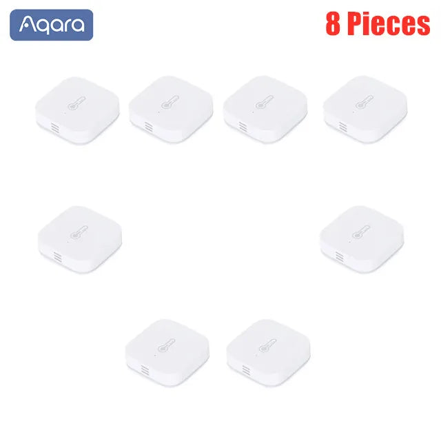 Eight small, square, white plastic Aqara smart sensors with a thermometer icon, arranged in a grid against a white background.