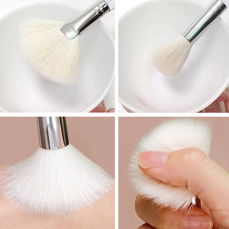 Soft facial mask brush with white bristles and silver handle, perfect for gentle skincare and face mask application.