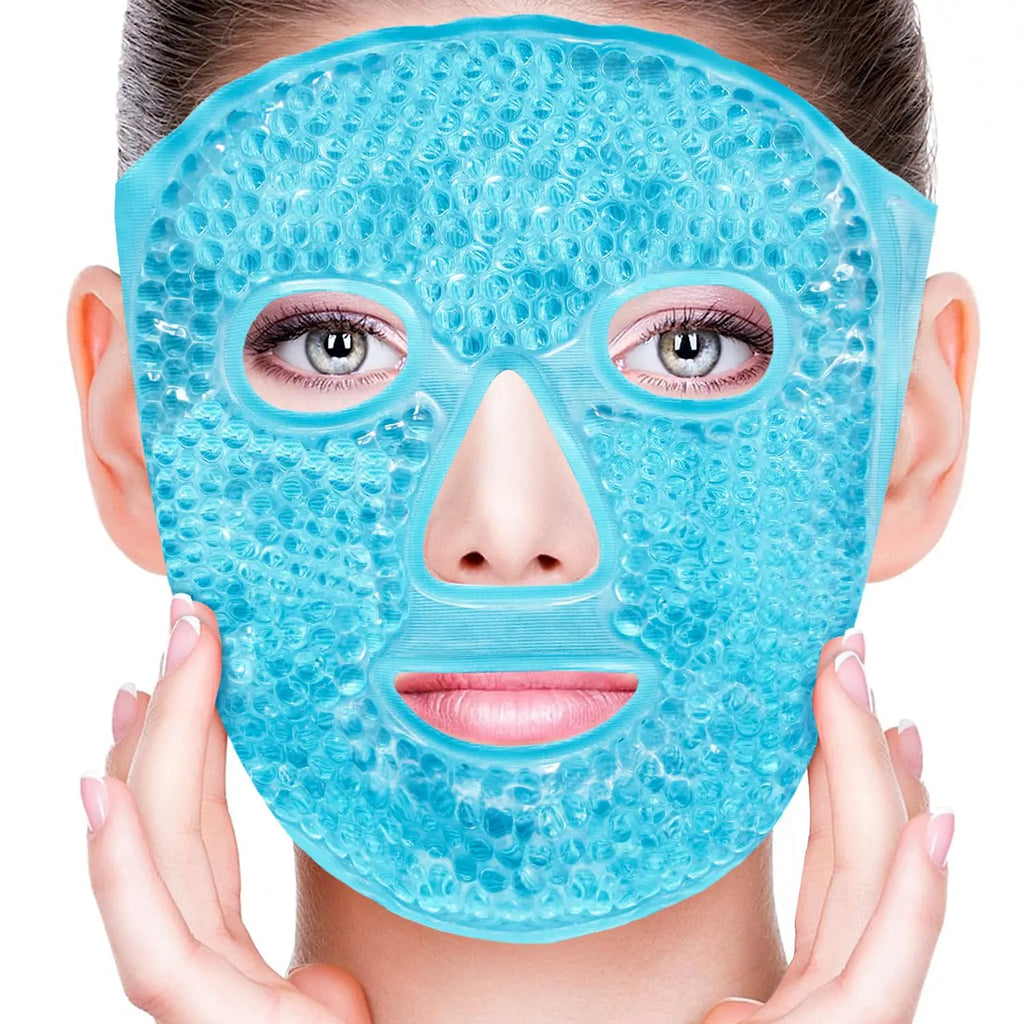 A person wears a blue, gel-bead face mask designed for cold or hot compress therapy.
