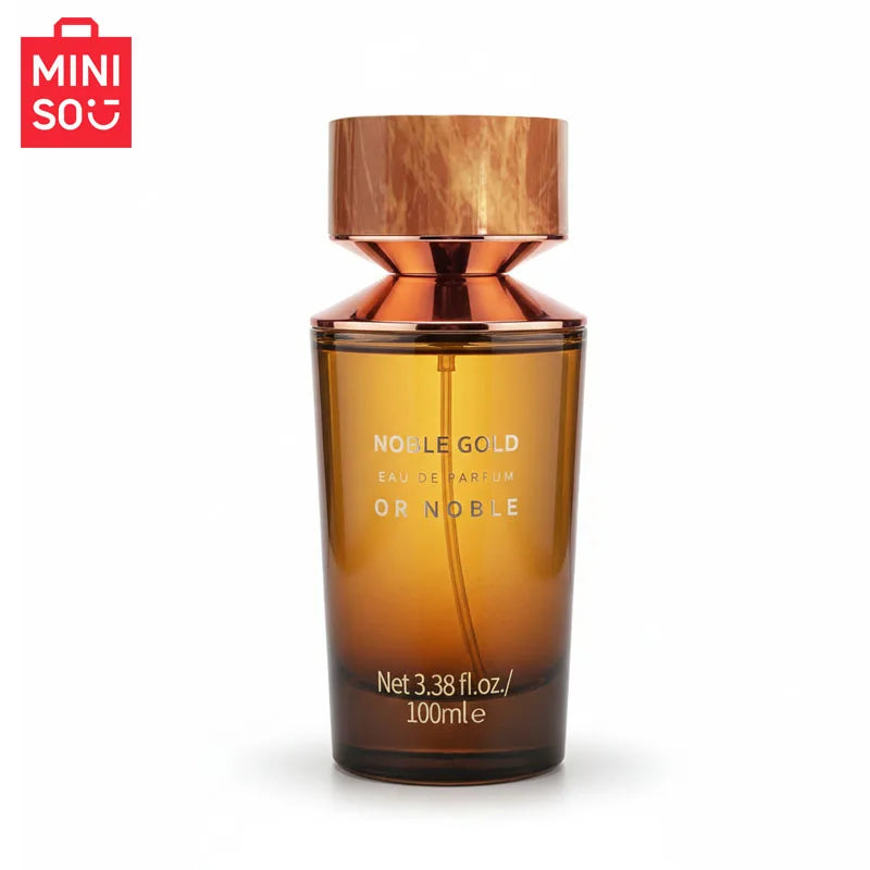 MINISO Noble Gold woody Eau de Parfum for men. Luxury 100ml amber glass bottle with unique metallic copper neck cap.