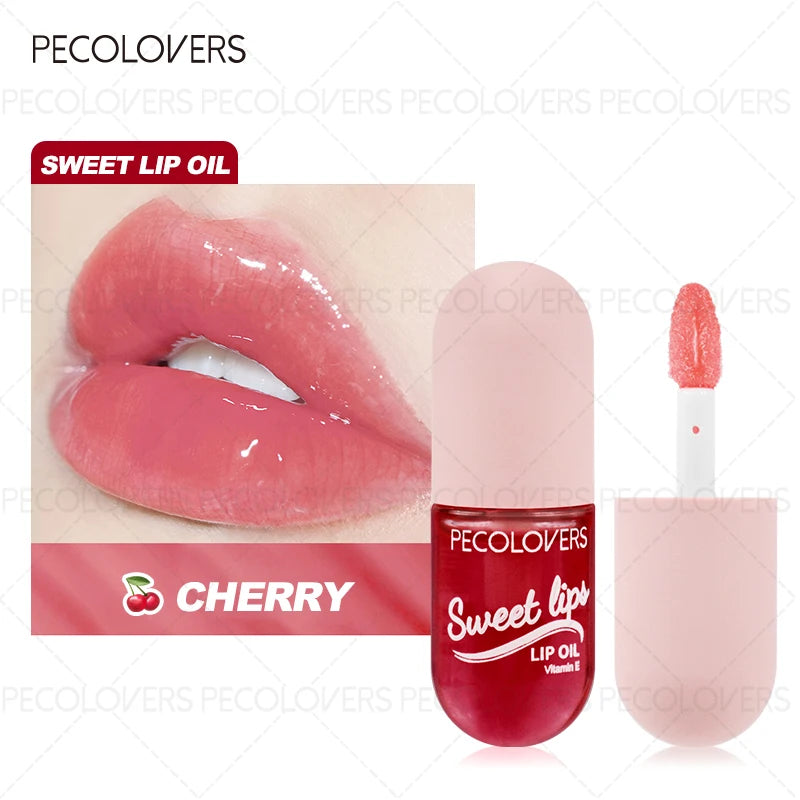Moisturizing Cherry Lip Oil, glossy plump finish, color-changing waterproof liquid lip makeup in a cute capsule bottle.