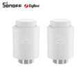 Two white Zigbee thermostatic radiator valves with ribbed control knob
