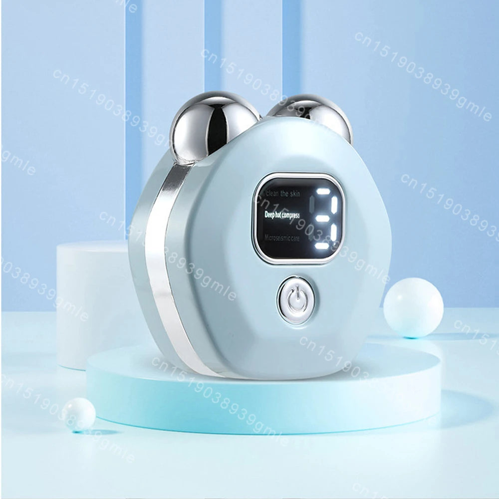 Light blue, round facial massager with two silver roller heads, a digital display, and power button, on a blue stand.