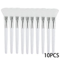 Ten identical face mask applicator brushes with white silicone heads, silver ferrules, and white handles.