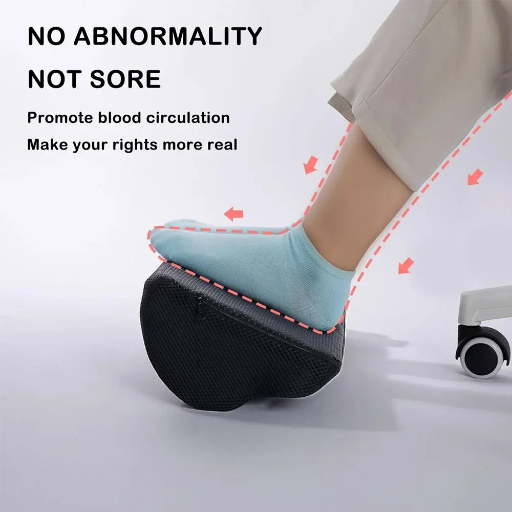 Ergonomic memory foam foot rest for under desk, black non-slip design, promotes blood circulation, washable cover.