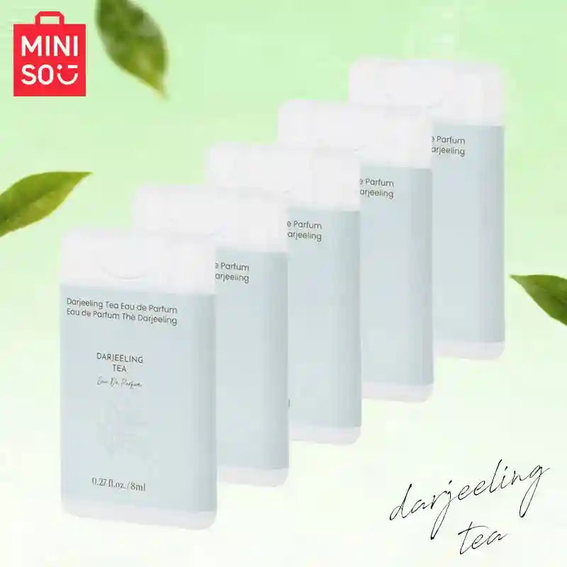 MINISO Darjeeling Tea EDP for men: 8ml portable flat woody fragrance spray in a clear pocket-sized bottle.