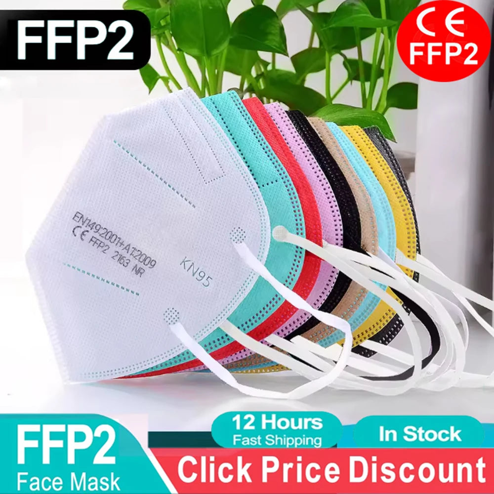 Stack of multi-colored 5-layer FFP2 KN95 face masks with textured fabric in white, teal, red, pink, black, and yellow.