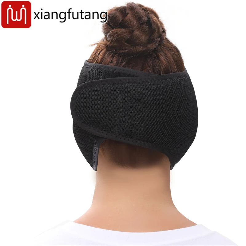 Black air-layer fabric heating half-face mask secured around the back of the head with a velcro strap.