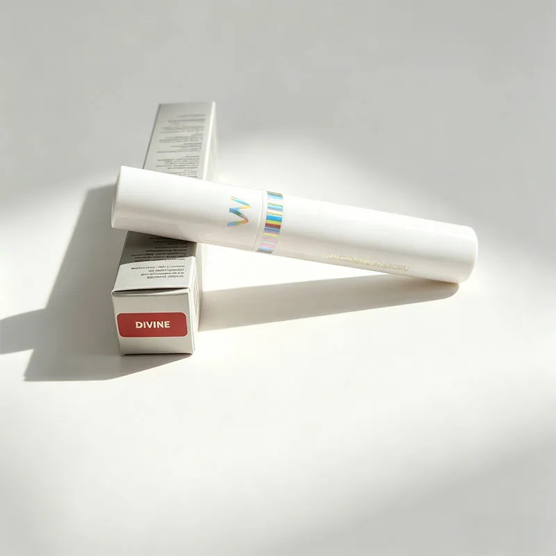 Wonderskin Divine peel-off lip stain tube and box, long-lasting waterproof pink lip tint in elegant white packaging.