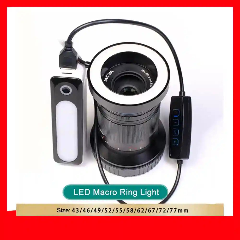 Black LED macro ring light attached to a camera lens, with power bank and inline controller for close-up photography.