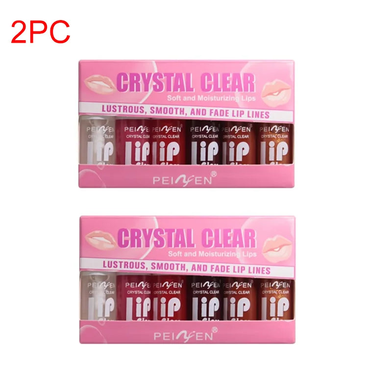 6-piece set of hydrating, transparent lip oil and moisturizing lip glaze in pink display boxes for lustrous lips.