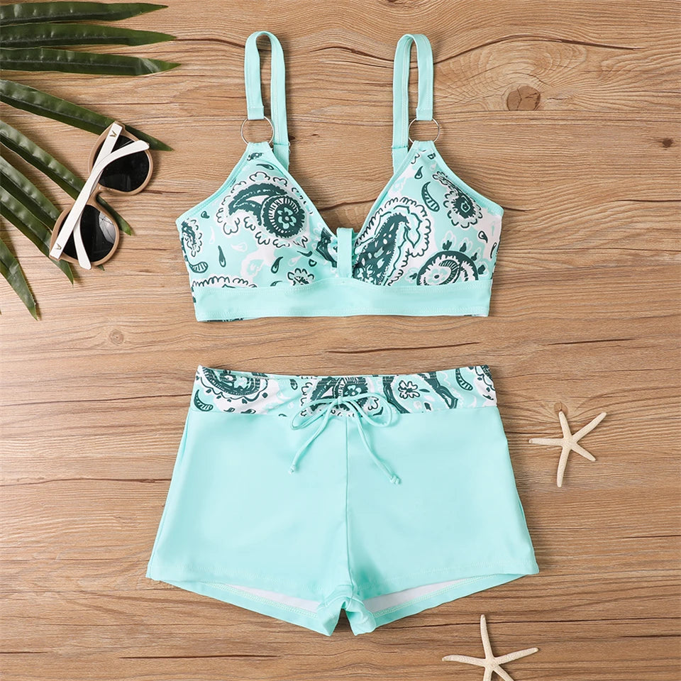 Tidesmit teal paisley high-waisted bikini set with a padded sports top, featuring ring straps and drawstring shorts.