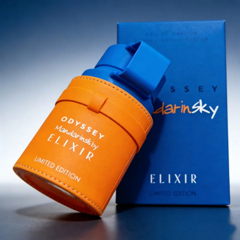 Odyssey Mandarin Sky Elixir 100ml: Unisex Arabic EDP, luxury orange leather-wrapped bottle with floral notes.