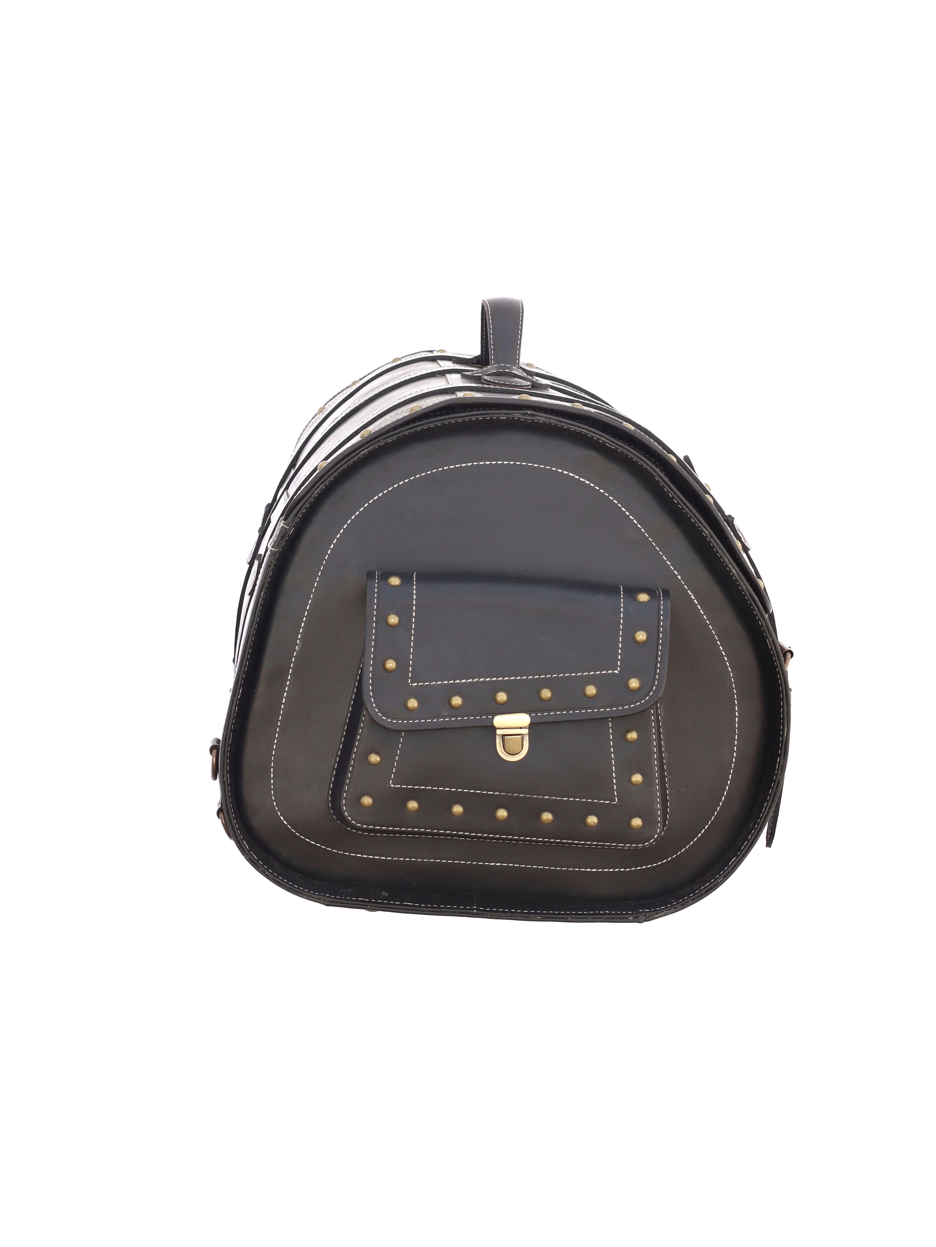 Large black leather trunk bag, vintage luggage style with brass studs, front pocket, and a secure top handle.
