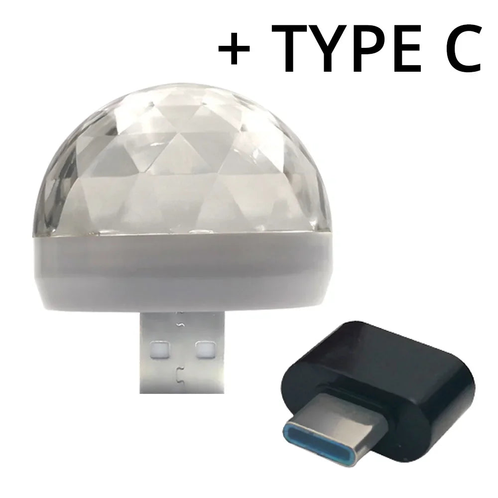 Clear, faceted dome USB ambient light with a black USB-C adapter for portable lighting.