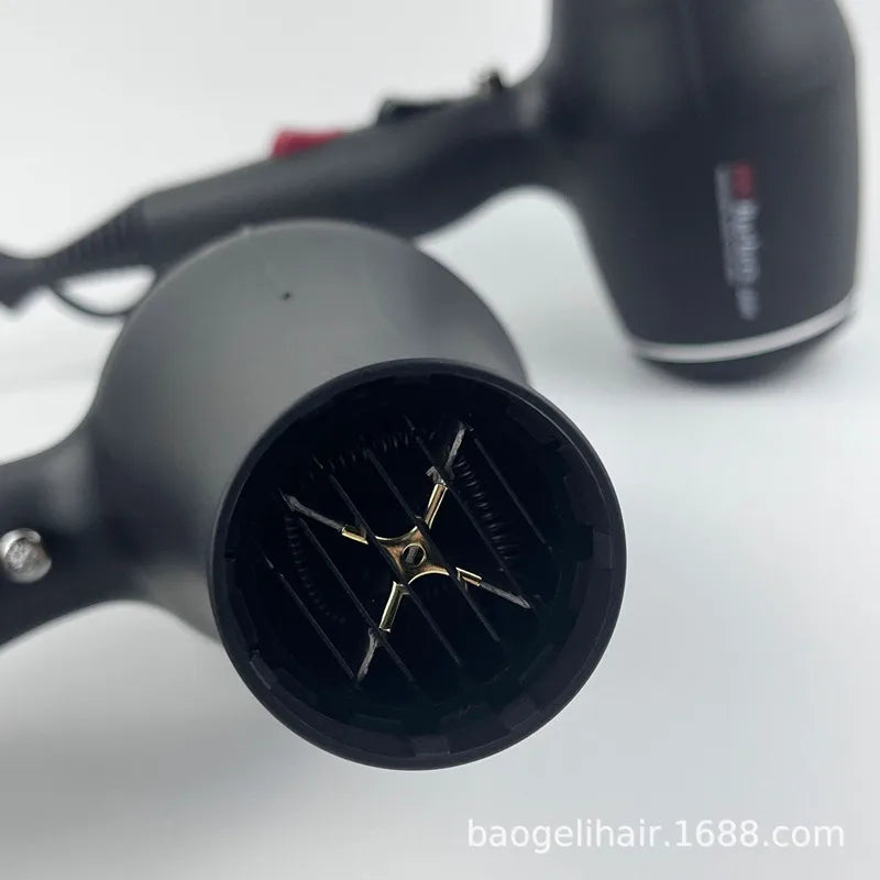 Matte black 2600W ionic hair dryer with heating element and nozzle, professional salon-quality styling tool.